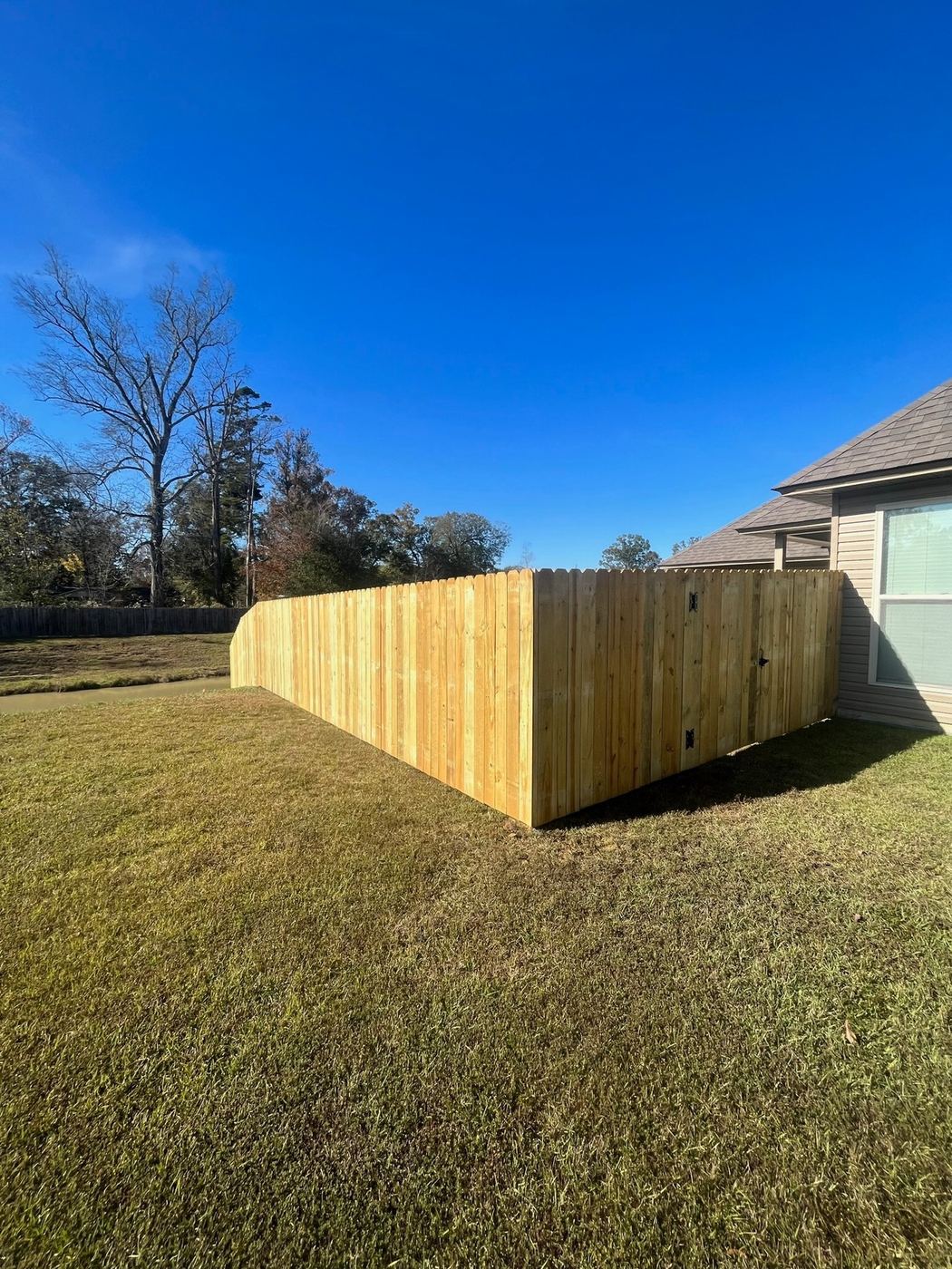 Wood dog ear privacy fence