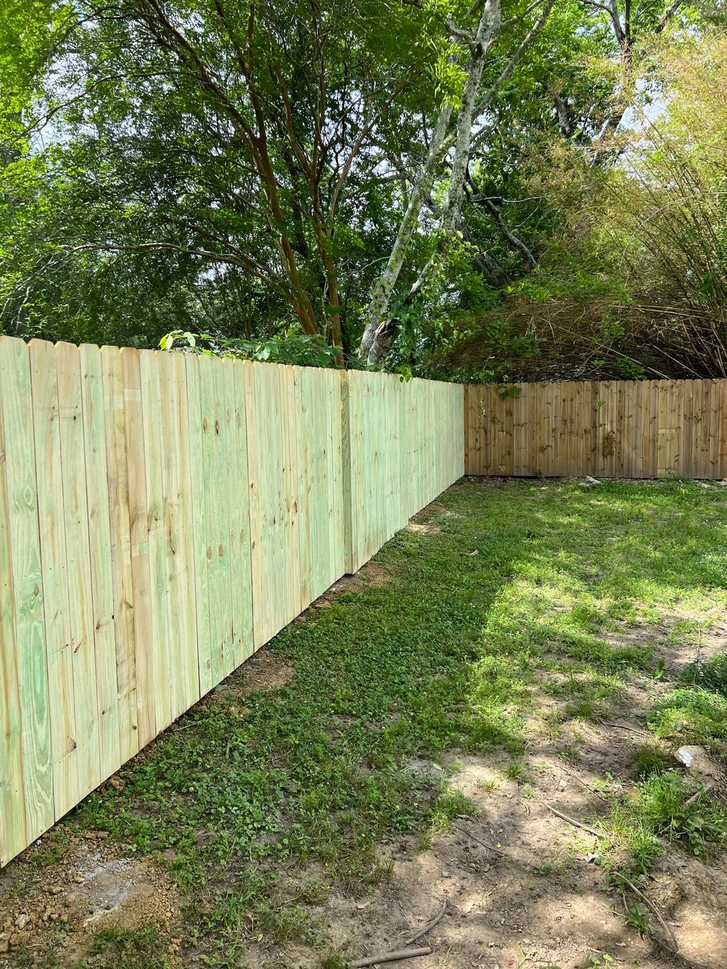 Wood dog ear privacy fence